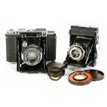 CAMERAS. ZEISS SUPER IKONTA WITH MAKER'S TESSAR 8CM F2.8 LENS, ORIGINAL LEATHER CASE, A ZEISS IKON