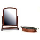 A VICTORIAN MAHOGANY DRESSING MIRROR, 71CM H AND AN EARLY 20TH CENTURY TWO HANDLED OVAL COPPER PAN