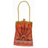 A 1920S ART DECO COLOURED CHAIN MAIL AND LACQUERED BRASS EVENING BAG WITH CHAIN HANDLE, OF