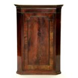 A 19TH CENTURY MAHOGANY CORNER CUPBOARD, 71CM W