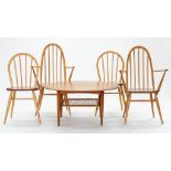 A SET OF FOUR ERCOL BEECH STICK BACK CHAIRS AND A SIMILAR LOW ROUND TABLE, 100CM DIAM