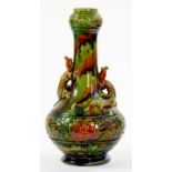 A VICTORIAN MAJOLICA VASE IN THE STYLE OF DR. CHRISTOPHER DRESSER WITH LIZARD HANDLES AND GARLIC