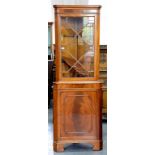 A MAHOGANY STANDING CORNER CABINET, 67CM W