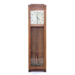 AN OAK IBM FLOOR STANDING ELECTRIC TIMEPIECE WITH A DOOR, 155CM H