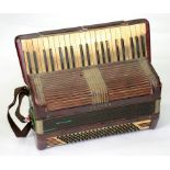A HOHNER PIANO ACCORDIAN,, CASED