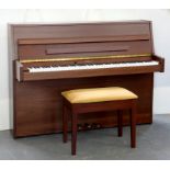 AN EAVESTAFF MAHOGANY UPRIGHT PIANO, NUMBER 215869, WITH THREE PEDALS, 141CM W AND A PIANO STOOL
