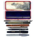 A WATERMAN'S SILVER IDEAL FOUNTAIN PEN AND CAP, OF NARROW REEDED DESIGN, HALLMARKED LONDN 1914 AND