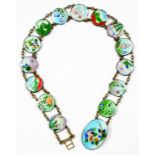 A JAPANESE SILVERED BRASS AND CLOISONNE ENAMEL (GIN BARI) BELT, THE OVAL WAIST CLASP 5.5CM W,