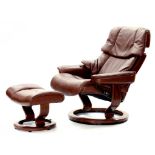 A STRESSLESS BLISS BROWN HIDE LEATHER ARMCHAIR AND FOOTSTOOL