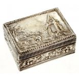 A CONTINENTAL SILVER SNUFF BOX, THE LID EMBOSSED WITH A WINDMILL, THE SIDES WITH SCROLLING