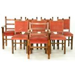A SET OF EIGHT OAK DINING CHAIRS