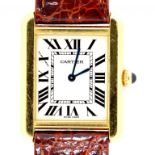 A CARTIER BI-METAL LADY'S WRISTWATCH, TANK 2.4 x 3cm, maker's mark and 750, the stainless steel back