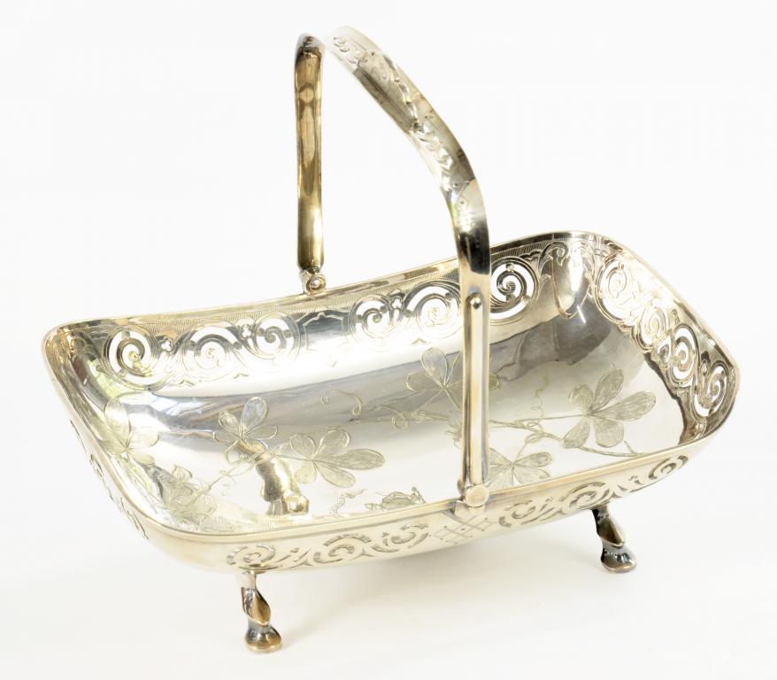 AN EPNS PIERCED OBLONG CAKE BASKET, C1905 engraved with foliage, crested, 26cm w, marked 416 ++As