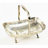 AN EPNS PIERCED OBLONG CAKE BASKET, C1905 engraved with foliage, crested, 26cm w, marked 416 ++As