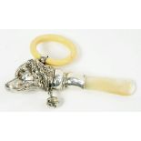 AN EDWARD VII SILVER DOG'S HEAD NOVELTY BABY'S RATTLE with mother of pearl handle, 12cm l, by