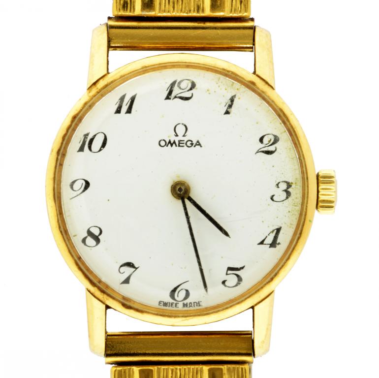 AN OMEGA 9CT GOLD LADY'S WRISTWATCH 2.2cm diam, London 1977, associated expanding bracelet and