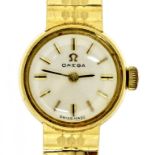 AN OMEGA 9CT GOLD LADY'S WRISTWATCH London 1968, 1.6cm diam, on 9ct gold bracelet, 19g ++In