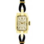 A GUBELIN 14CT GOLD LADY'S WRISTWATCH the chamferred case 1.4 x 2.9cm, Swiss control marks, the back