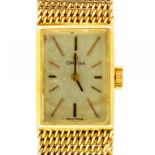 AN OMEGA 9CT GOLD LADY'S WRISTWATCH London 1969, 1.4 x 1.8cm,on gold mesh bracelet with Omega device