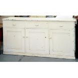 A VICTORIAN PINE DRESSER BASE, LATER PAINTED WHITE, 180CM W