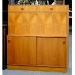 A 1970'S TEAK WRITING CABINET, 134CM X 121CM