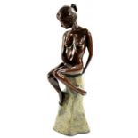 A BRONZE SCULPTURE OF A NAKED YOUNG WOMAN SEATED ON A ROCK, RICH BROWN PATINA, 50CM H, LATE 20TH C