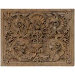 A 17TH CENTURY STYLE CARVED OAK PANEL, 60CM X 47CM