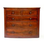 A VICTORIAN MAHOGANY BOW FRONTED CHEST OF DRAWERS, 119CM W