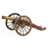 A CAST METAL ALLOY AND WOOD MODEL OF A CANNON, 74CM OVERALL, LATE 20TH C