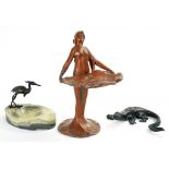 AN ART NOUVEAU BRONZED METAL SCULPTURE OF A SLENDER YOUNG WOMAN HOLDING A DISH OF LEAVES, 14CM H,