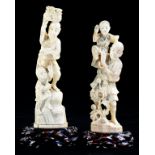 TWO JAPANESE IVORY CARVINGS OF A MAN AND BOY, ONE CARRYING A BASKET OF FRUIT, 20.5CM H AND