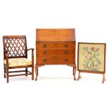 A MAHOGANY BUREAU, AN ELBOW CHAIR AND A FOLDING TABLE