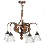 AN ARTS & CRAFTS EARLY ELECTRIC COPPER FIVE LIGHT CHANDELIER, C1910 of organic inspiration, hammer