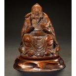 A CHINESE BAMBOO CARVING OF AN IMMORTAL 15cm h and a wood stand (2) ++Some dust but in good