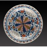 A JAPANESE IMARI DISH, EDO PERIOD, 18TH C decorated with prominent kiku, the flanged rim with