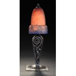A WROUGHT-IRON LAMP AND MOTTLED BLUE AND RED GLASS SHADE 35cm h, lampshade with indistinct etched