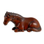 A JAPANESE BOXWOOD NETSUKE OF A RECUMBENT HORSE, EDO PERIOD, 18TH/19TH C unsigned, 4.5cm l ++Good