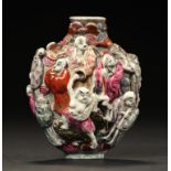 A CHINESE MOULDED PORCELAIN 'IMMORTALS' SNUFF BOTTLE, C EARLY 20TH C 7cm h, Qianlong mark ++