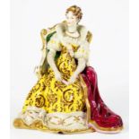 A GERMAN PORCELAIN FIGURE OF A SEATED LADY, 18CM H, 20TH C,