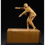 GORDON C BROWN (2OTH/21ST CENTURY) PETRUSHKA limewood, 34cm h The sculpture was based on Peter