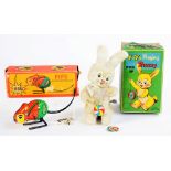 VINTAGE TOYS. A JAPANESE YOYO WIND UP BUNNY, BOXED, 1960'S AND A CONTEMPORARY EAST GERMAN JUMPING