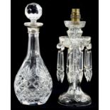 A CUT GLASS LUSTRE LAMP, 27CM H, EXCLUDING FITMENT AND A SILVER MOUNTED CUT GLASS DECANTER WITH