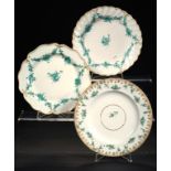 THREE DERBY PLATES WITH GREEN MONOCHROME DECORATION, C1775-90 painted with swags and a central spray