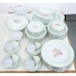 A JAPANESE PORCELAIN DINNER SERVICE DECORATED WITH ROSES IN EAU DE NIL AND PLATINUM RIM