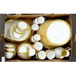 A BONE CHINA TEA SERVICE WITH BLACK AND GILT GREEK KEY BORDER