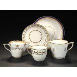 TWO DERBY CREAM JUGS, A FLUTED TEACUP AND SAUCER AND A DISH, C1795-1800 in different set patterns,