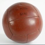 A LEATHER MEDICINE BALL