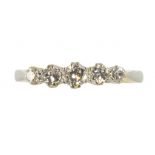 A DIAMOND FIVE STONE RING IN GOLD, MARKED 18CT PLAT, 2.7G