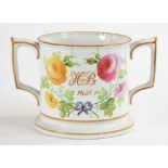 A STAFFORDSHIRE EARTHENWARE LOVING CUP, DATED 1851, PAINTED WITH INITIALS AND FLOWERS, 14CM H (