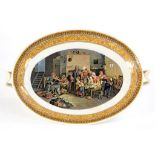 AN F & R PRATT & CO OVAL COMPORT DECORATED WITH THE BLIND FIDDLER AFTER SIR DAVID WILKIE, 34CM